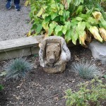 animal faces carved from wood