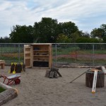 wheelbarrows in sand